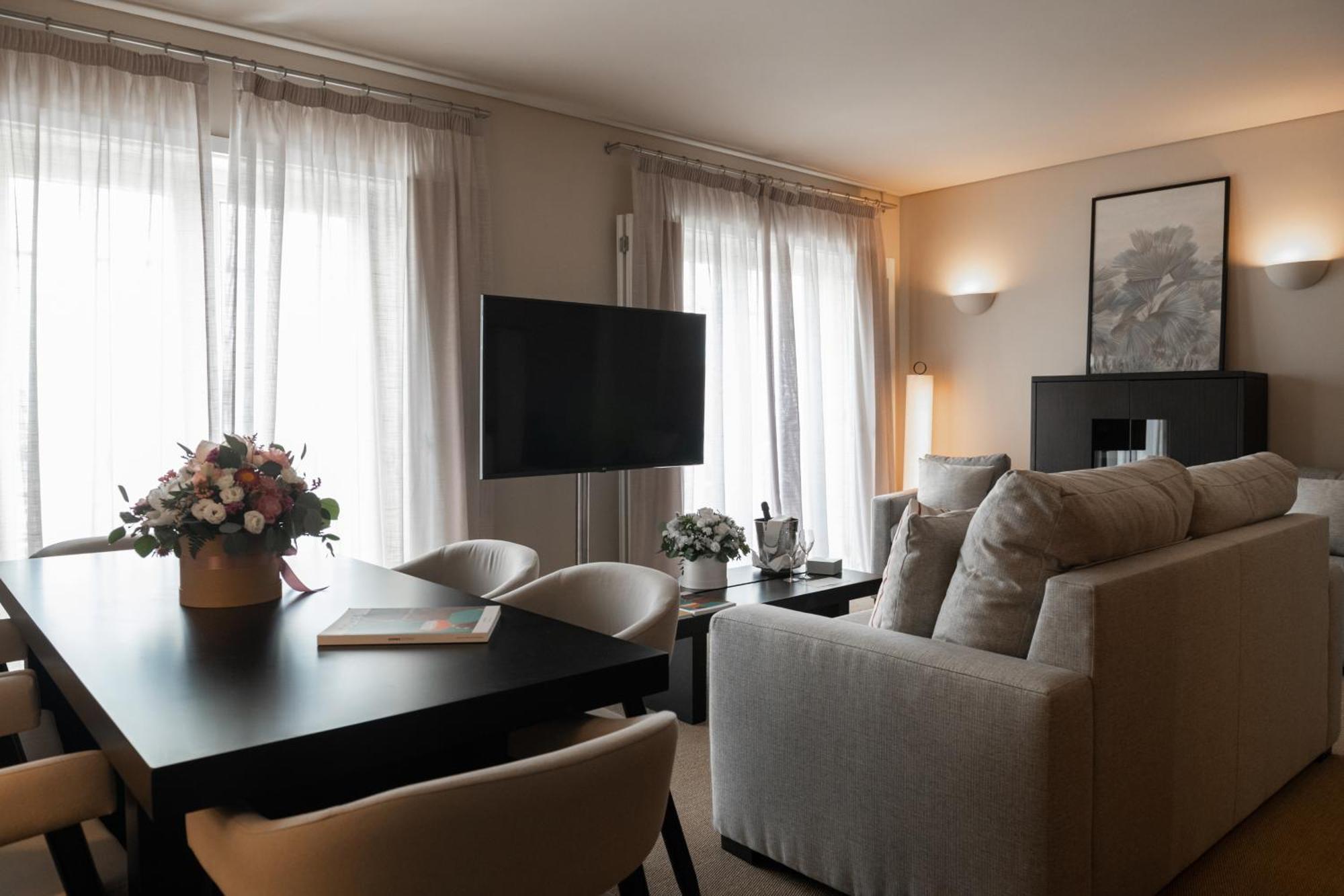 Domes Lake Algarve, Autograph Collection Vilamoura Kültér fotó A living room in a serviced apartment in Madrid, Spain